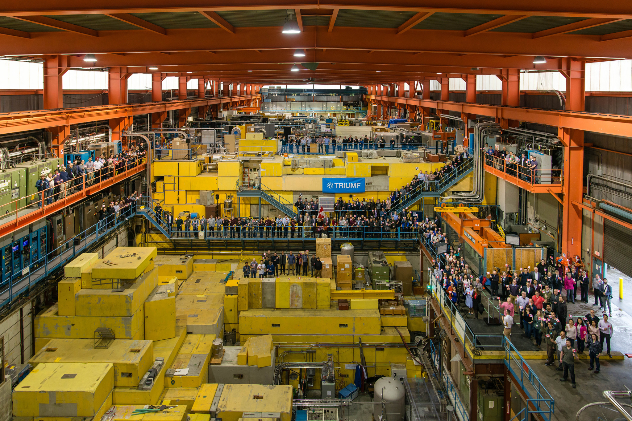 TRIUMF staff pose in the Meson Hall